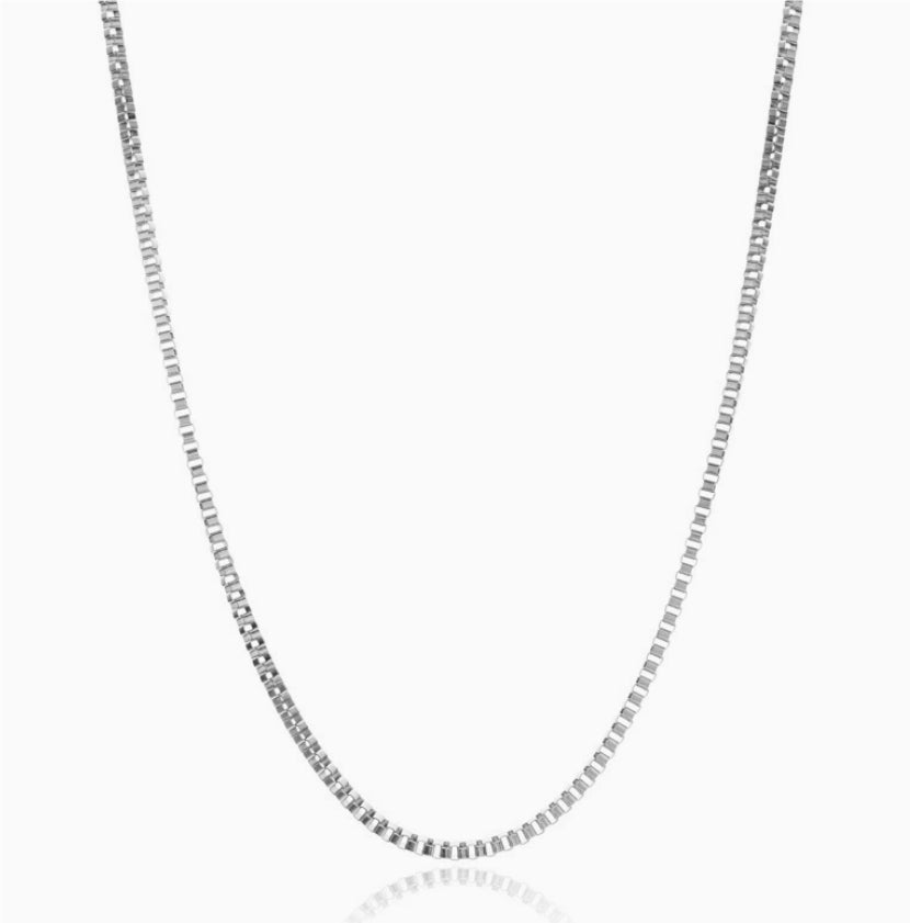 Silver chain necklace on a white background